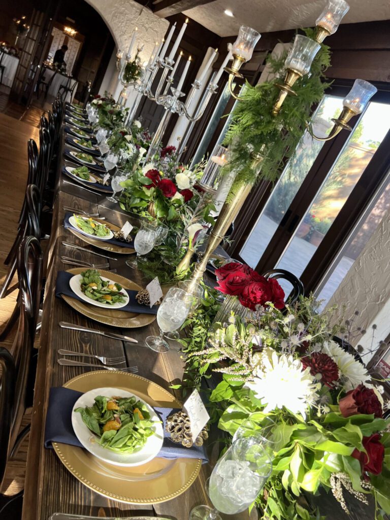 A long table with many plates of food on it