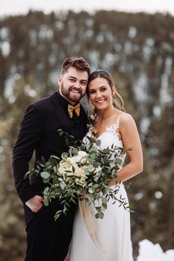 A man and woman posing for a picture.